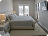 Master bedroom with king bed, desk and smat TV. All new linens/bedding 2021