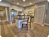 Chefs kitchen, marble floors, stainless appliances, high end cookware